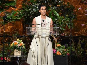 Kim-Kardashian-on-chest-forget-me-not-flower-armenian-genocide-symbol