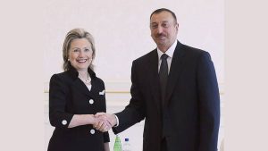 U.S. Secretary of State Hillary Clinton (L) shakes hands with Azerbaijan's President Ilham Aliyev during their meeting in Baku, July 4, 2010.
