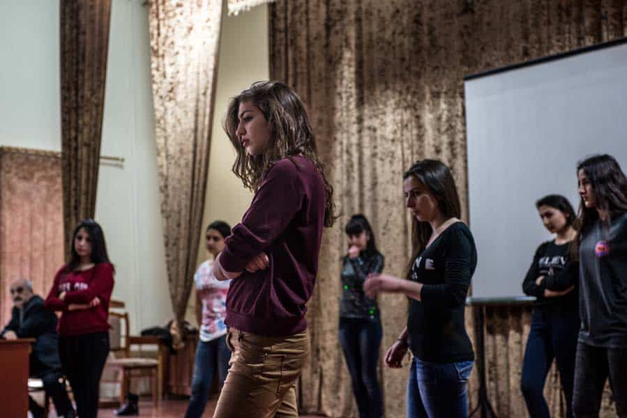 Anna Sargsyan, 19, stands during the rehearsal for a musical organized for International Women's Day at Artsakh State University in Stepanakert. KARL MANCINI, GIANMARCO MARAVIGLIA/ECHO