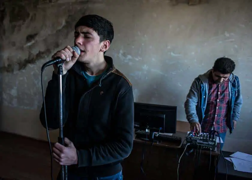 Yuri Adamyan, 18, rehearses in Liberal Arts College Arsen Khachatryan in Shushi. Adamyan dreams of becoming a singer and takes daily vocal lessons. KARL MANCINI, GIANMARCO MARAVIGLIA/ECHO